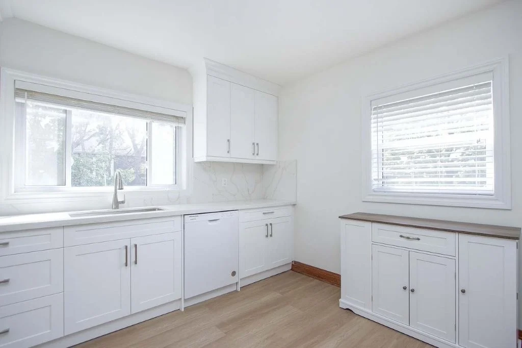 The updated bright white kitchen