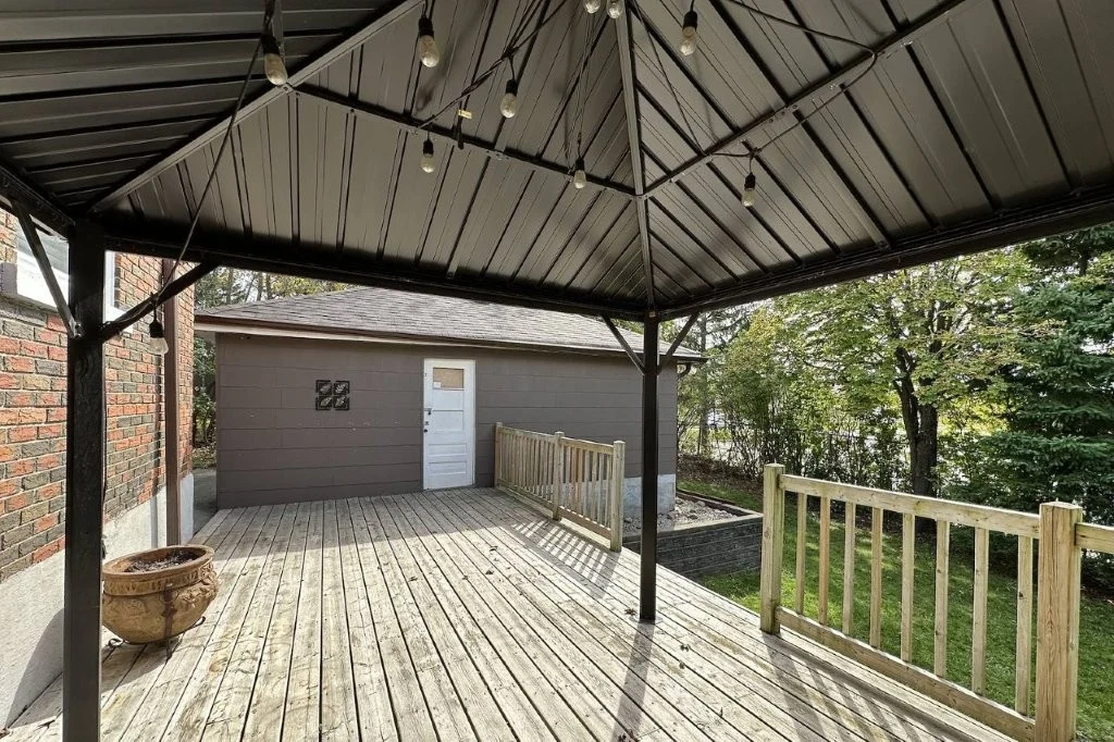 Covered gazebo with deck seating space